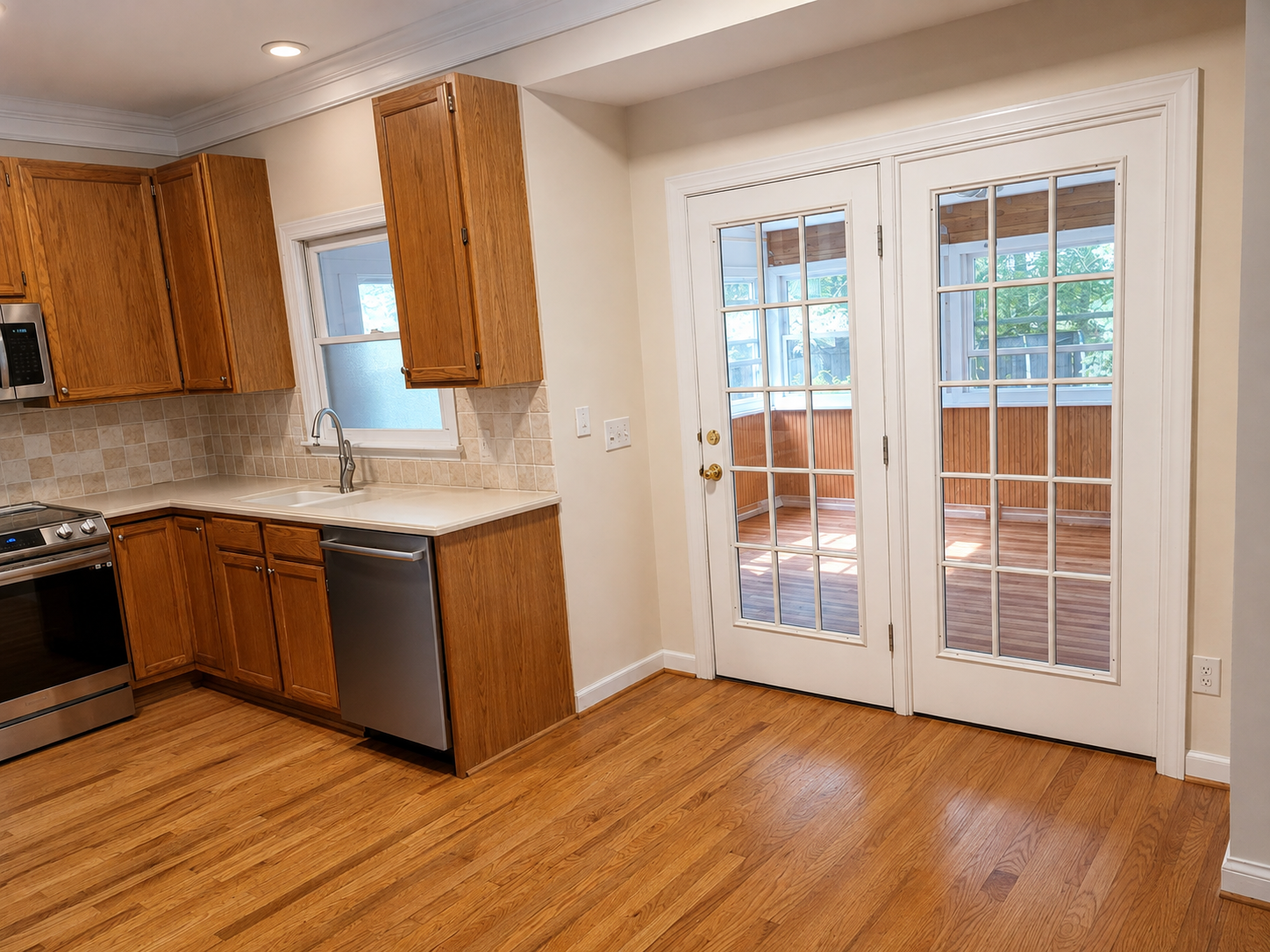 Kitchen in its original condition before the opening to the sunroom was created.